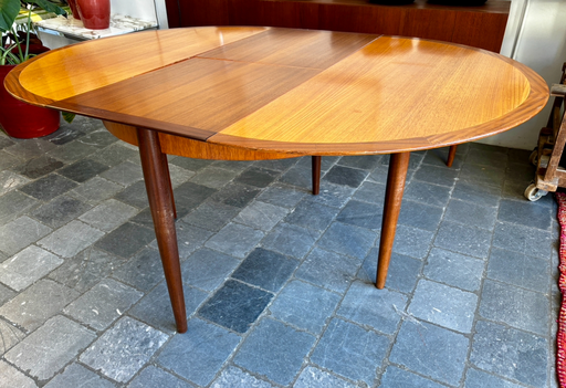 Table ronde bicolore avec allonge integréeD112xAll47xH71,5cm